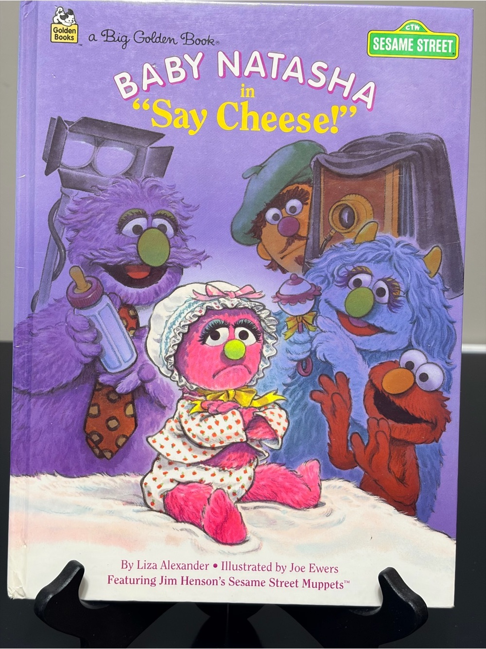 1994 Vintage Sesame Street Hardcover Book Titled: “Baby Natasha in Say Cheese!”